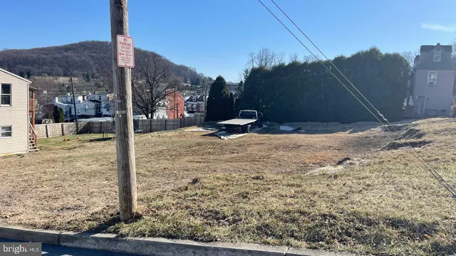 a view of a backyard of the house