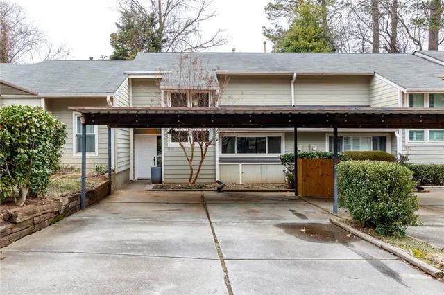 a front view of a house with a garage
