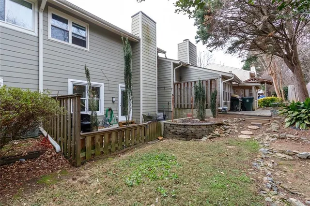 a view of a deck with open kitchen
