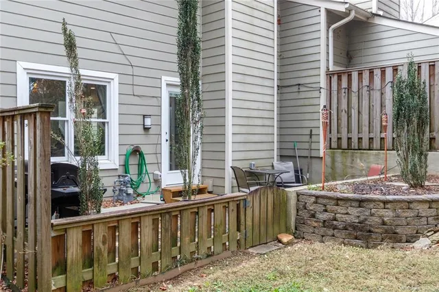 a backyard of a house with seating space
