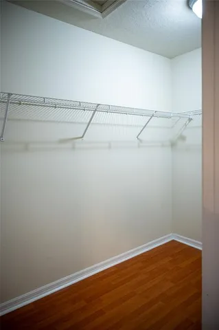 a view of an empty walk in closet