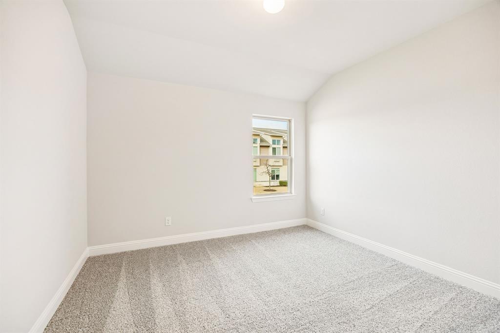 817 Heart Reef Road Plano, TX 75075 - Photo 18 of 21 a view of an empty room and window