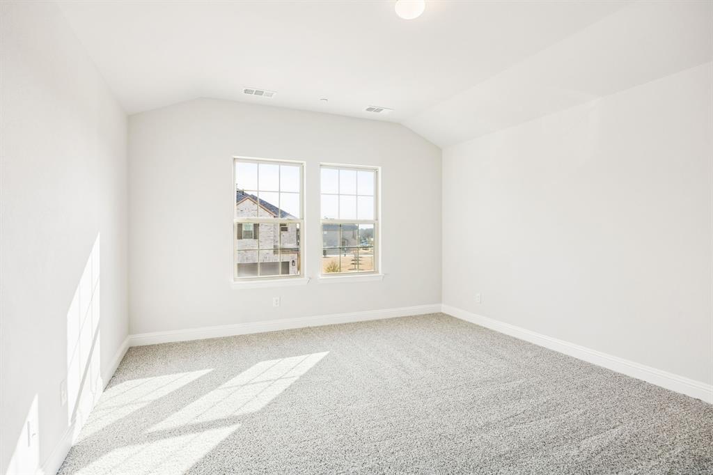 817 Heart Reef Road Plano, TX 75075 - Photo 20 of 21 a view of an empty room with a window