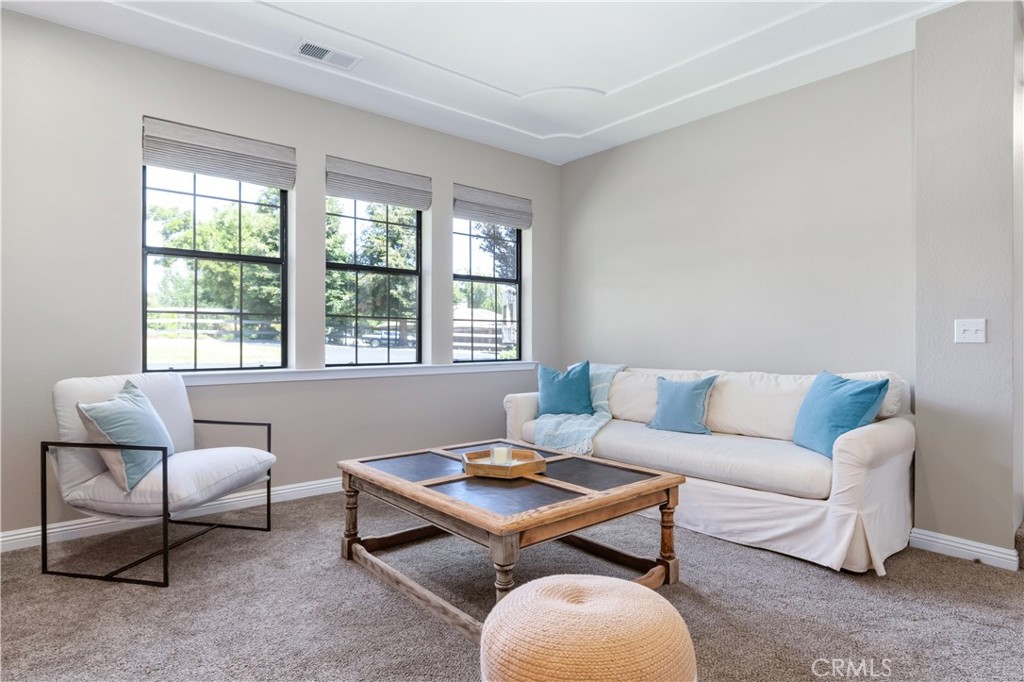 1275 Shane Lane Templeton, CA 93465 - Photo 27 of 70 a living room with furniture a table and a window