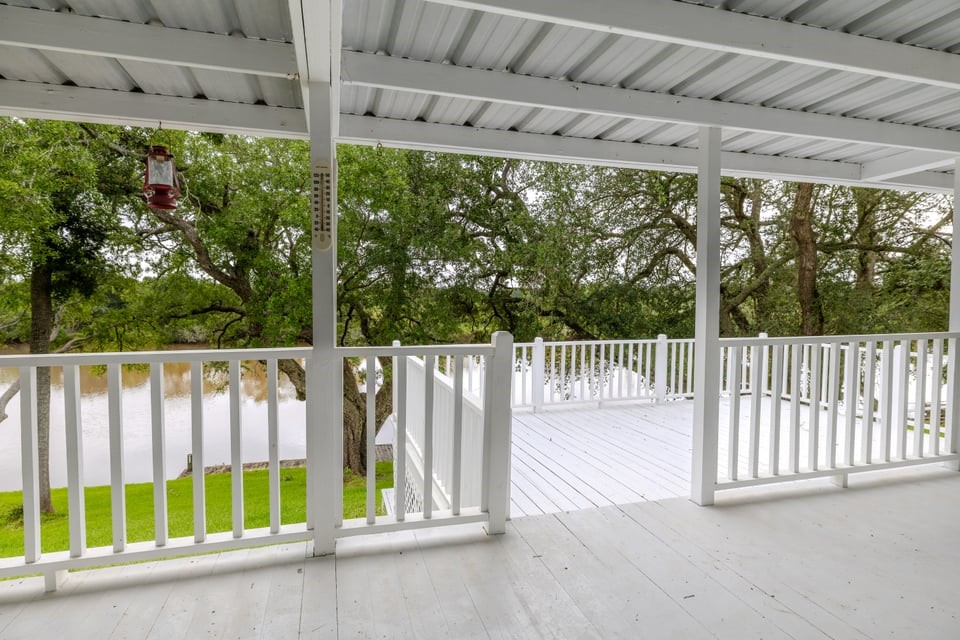 483 Riverside Drive Palacios, TX 77465 - Photo 31 of 41 a view of a wooden deck