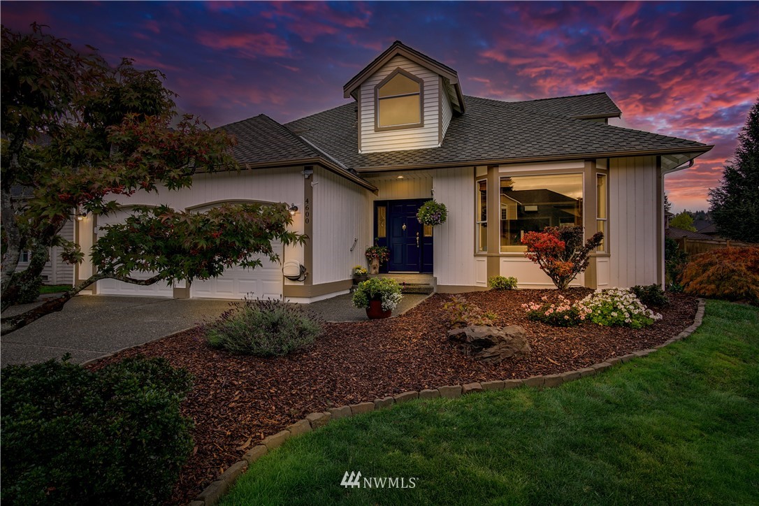 4600 Northeast 18th Street Renton, WA 98059 - Photo 1 of 1 a front view of a house with garden