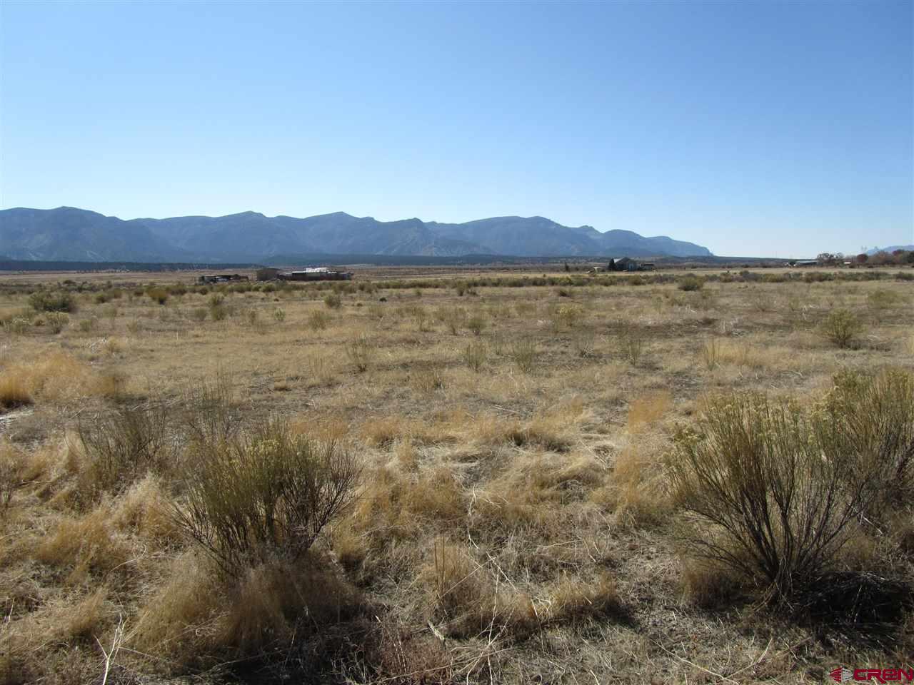 Lot 8 Road 29.4 Loop Cortez, CO 81321 - Photo 2 of 12 a view of lake and mountain view