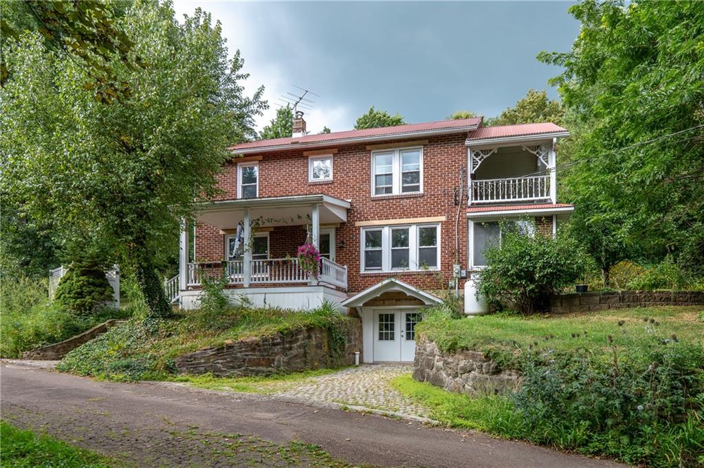 652 Tub Mill Run Road West Salisbury, PA 15565 - Photo 1 of 48 a front view of a house with garden