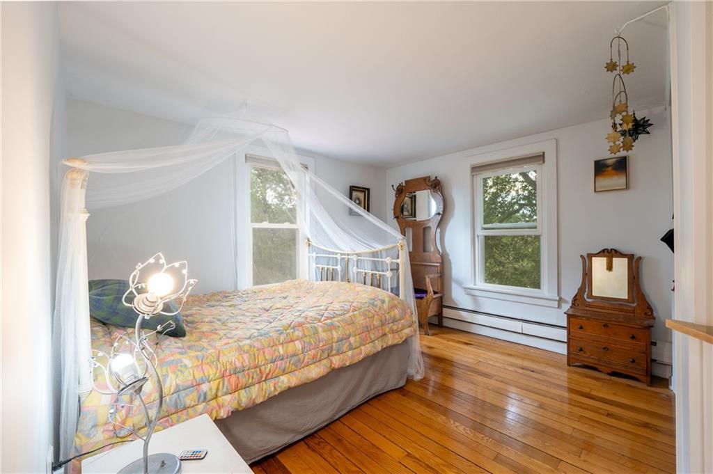 652 Tub Mill Run Road West Salisbury, PA 15565 - Photo 18 of 48 a bedroom with a bed and wooden floor