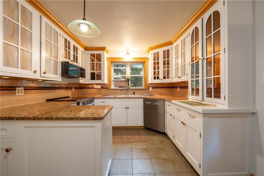 652 Tub Mill Run Road West Salisbury, PA 15565 - Photo 5 of 48 a kitchen with stainless steel appliances granite countertop a sink and a stove