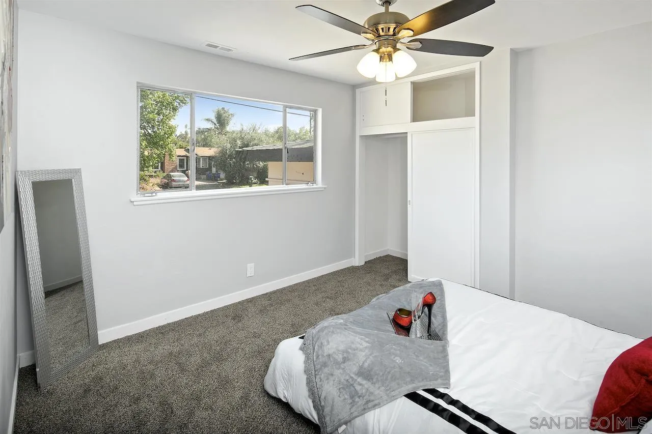 1050 Tiger Tail Road Vista, CA 92084 - Photo 14 of 28 a living room with furniture and a window