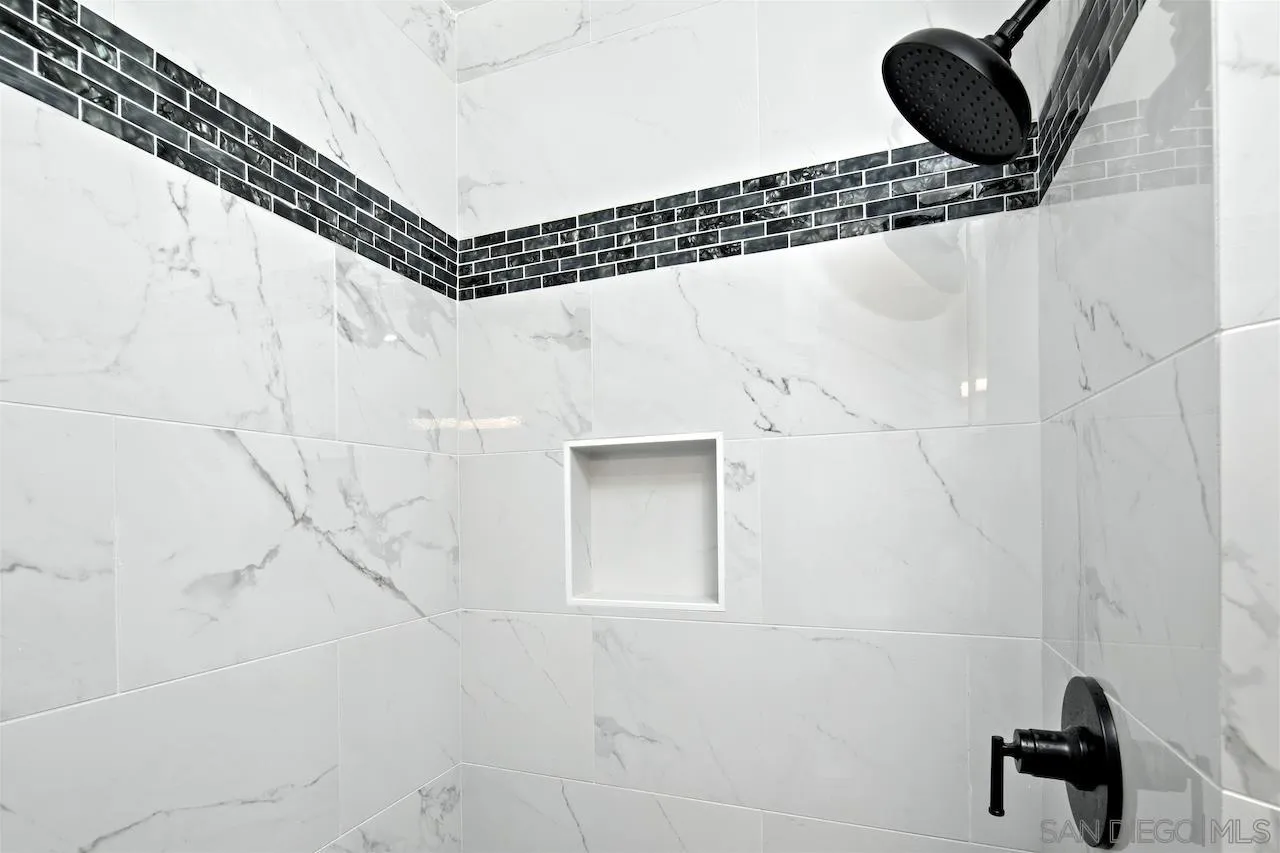 1050 Tiger Tail Road Vista, CA 92084 - Photo 16 of 28 a bathroom with a shower and a sink