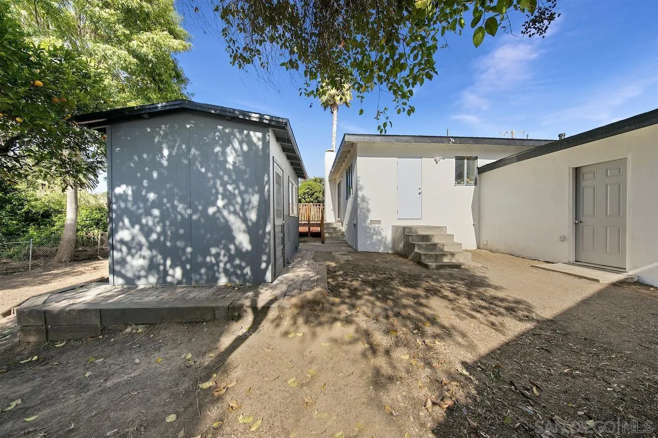 1050 Tiger Tail Road Vista, CA 92084 - Photo 26 of 28 a view of a house with a yard