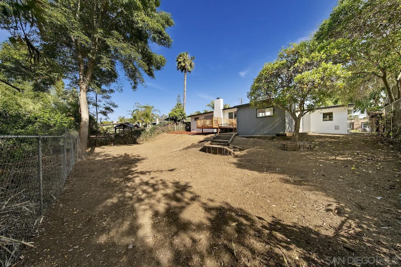 1050 Tiger Tail Road Vista, CA 92084 - Photo 28 of 28 a view of a backyard with a tree