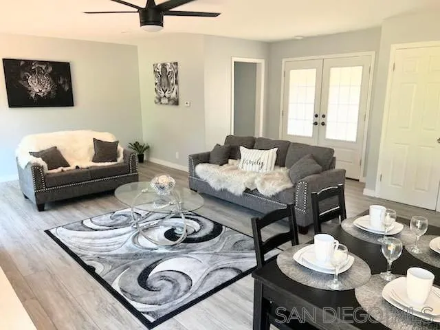 1050 Tiger Tail Road Vista, CA 92084 - Photo 4 of 28 a living room with furniture and a table