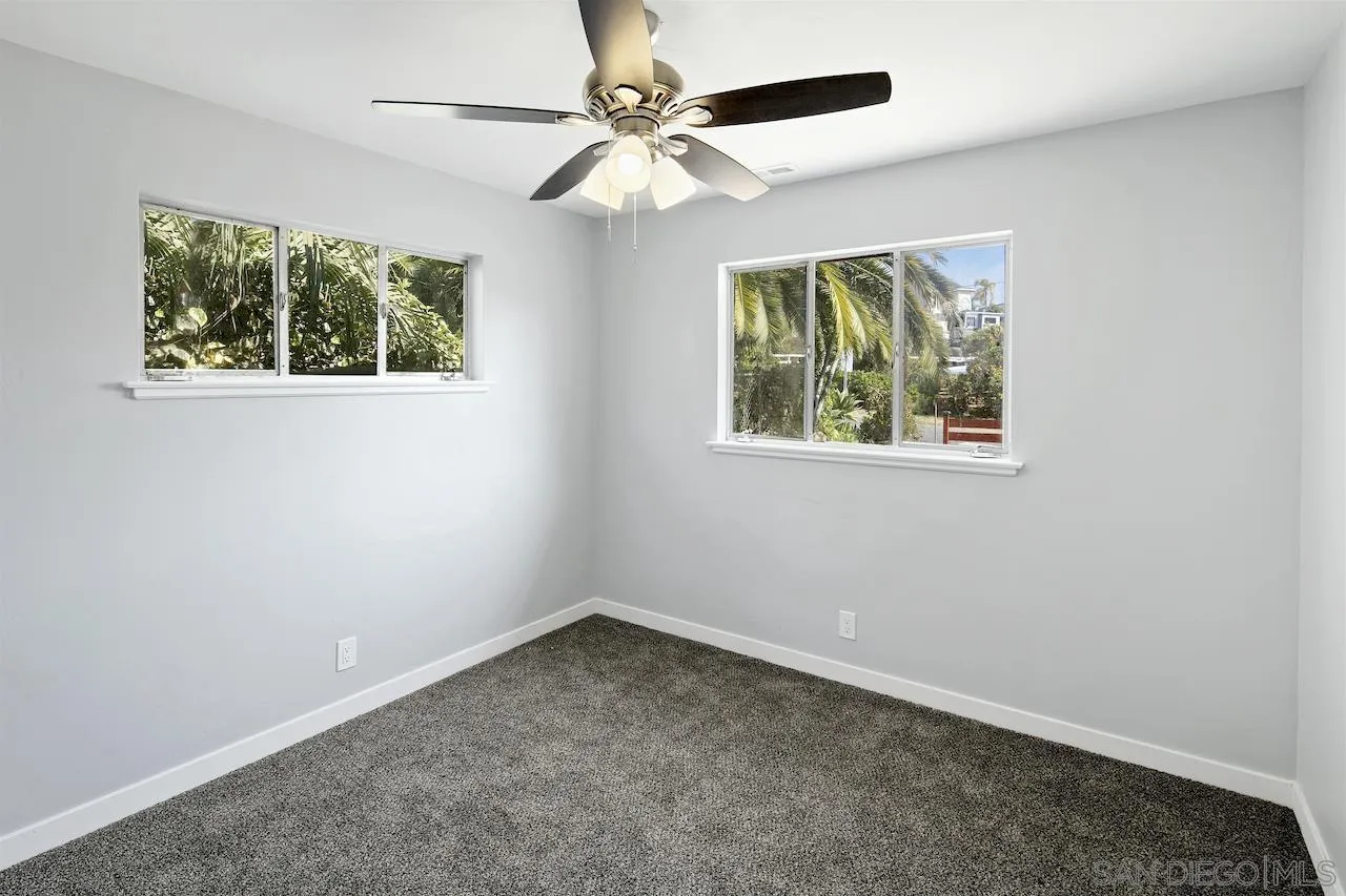 1050 Tiger Tail Road Vista, CA 92084 - Photo 10 of 28 an empty room with a window