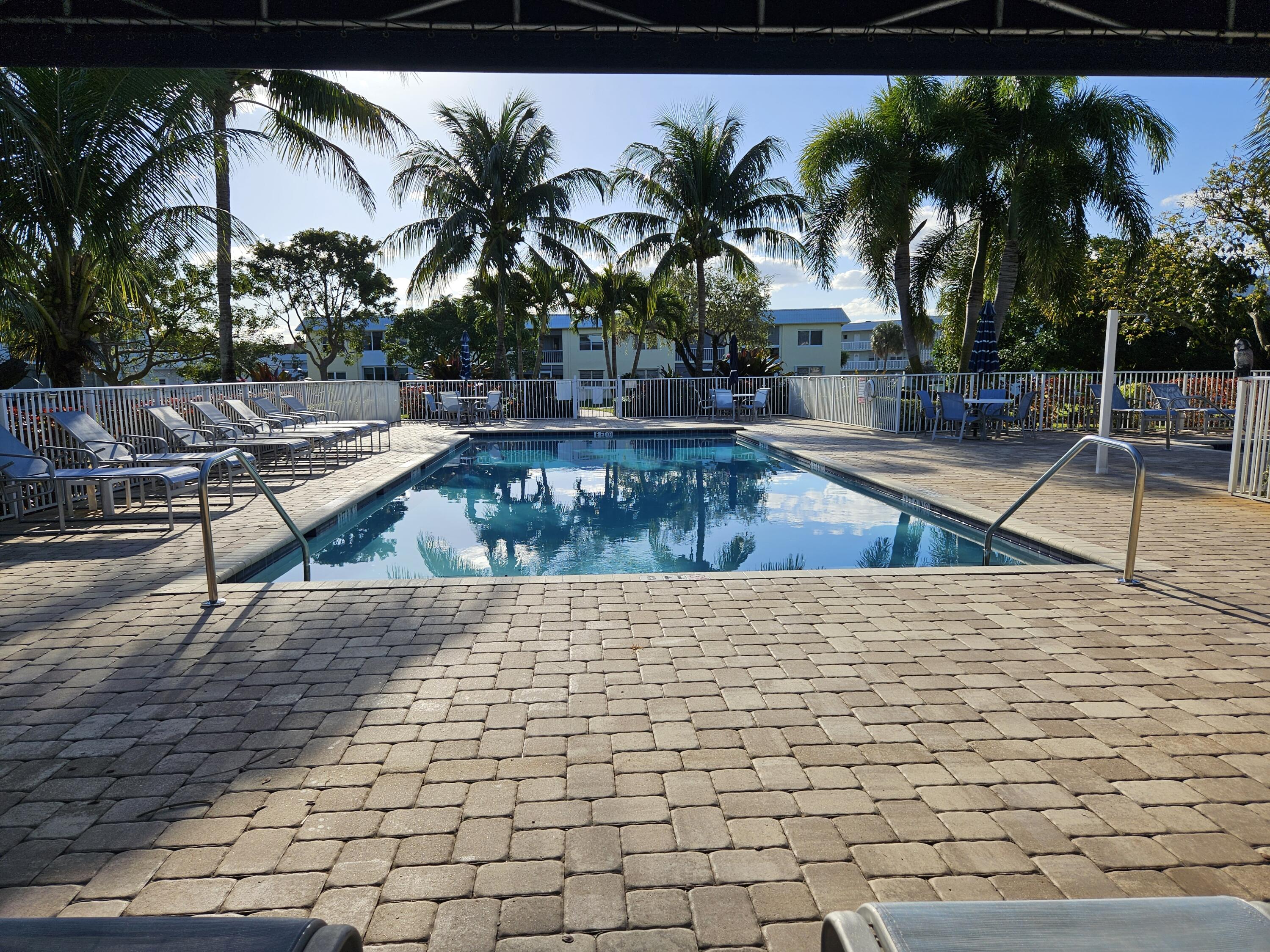 9818 Marina Boulevard Boca Raton, FL 33428 - Photo 12 of 17 a view of outdoor space with seating area