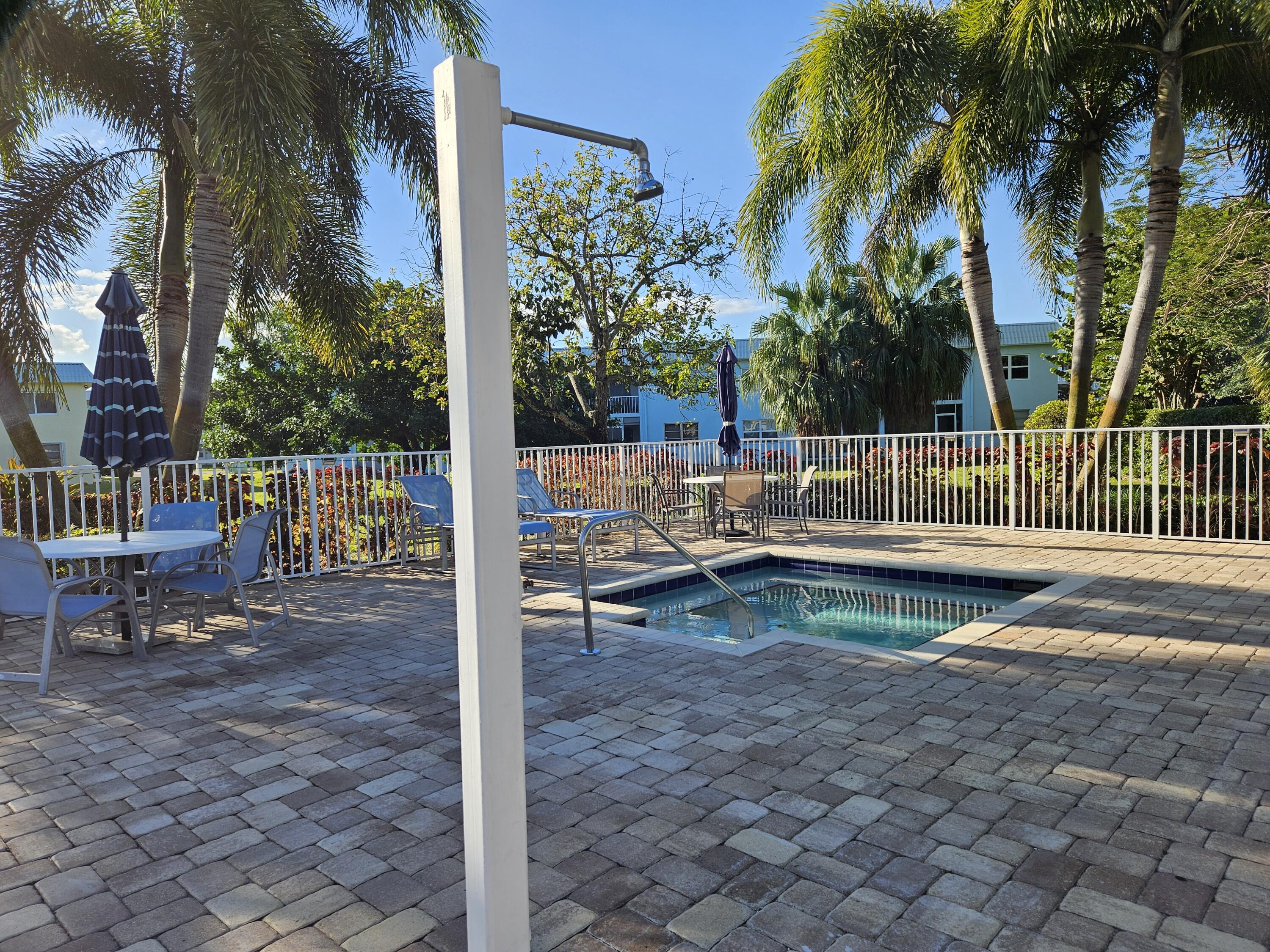 9818 Marina Boulevard Boca Raton, FL 33428 - Photo 13 of 17 a view of outdoor space with garden
