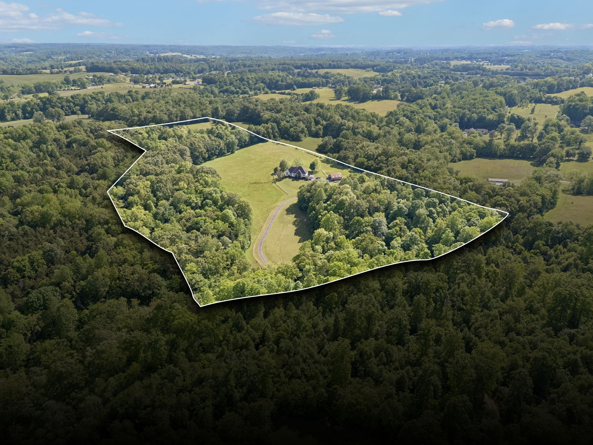250 Home Pl Road Dickson, TN 37055 - Photo 6 of 62 an aerial view of a house with a yard