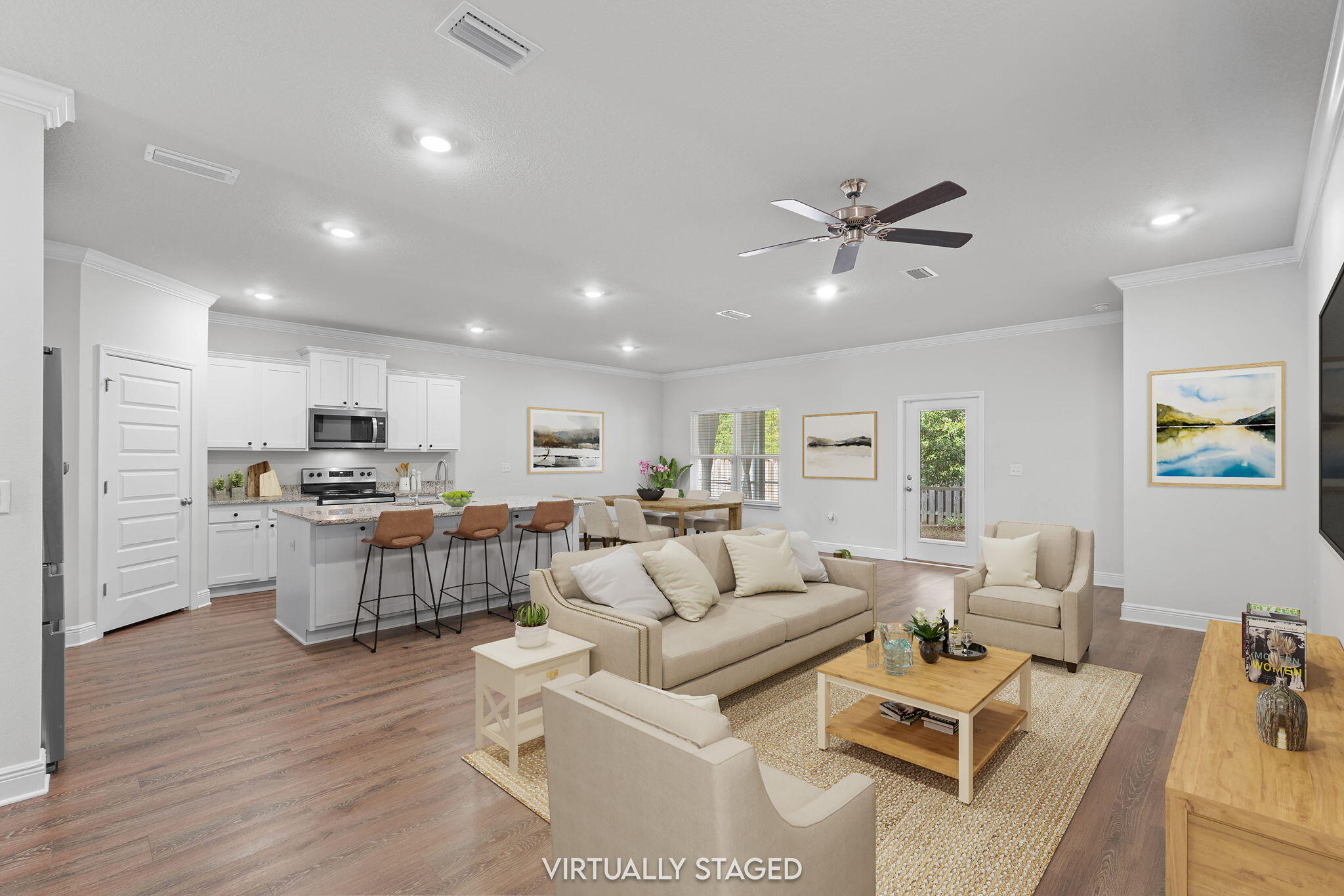 371 Lightning Bug Lane Freeport, FL 32439 - Photo 5 of 53 a living room with furniture kitchen view and a wooden floor