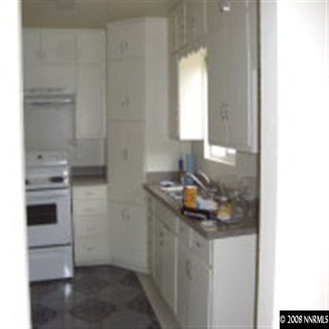 1850 Citron Street Reno, NV 89512 - Photo 6 of 9 a bathroom with a sink and a mirror
