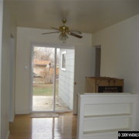 1850 Citron Street Reno, NV 89512 - Photo 8 of 9 a bedroom with a bed and a window