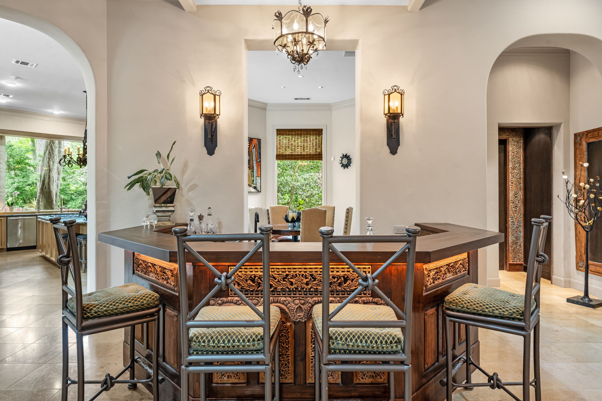 6 Mott Lane Houston, TX 77024 - Photo 27 of 50 Arched openings and a vaulted ceiling enhance the sense of volume, while seamless access to the kitchen, den and breakfast area makes this ideal of hosting and gathering.