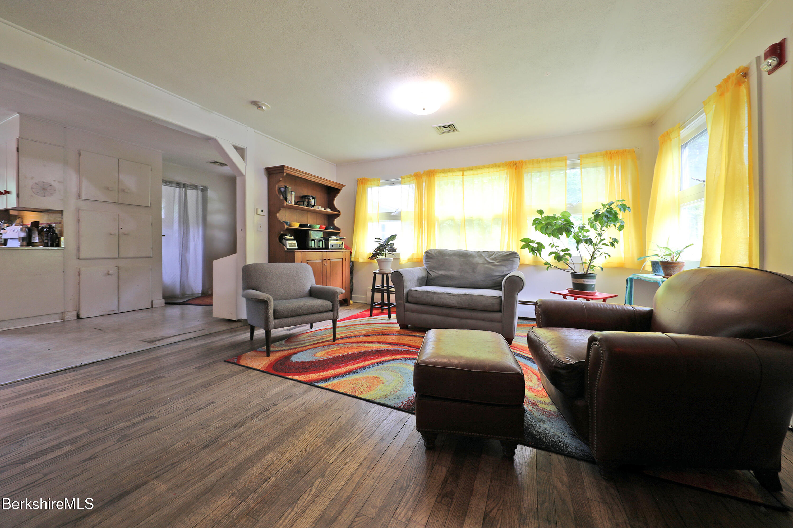 458 Monterey Road Great Barrington, MA 01230 - Photo 13 of 36 a living room with furniture and a large window