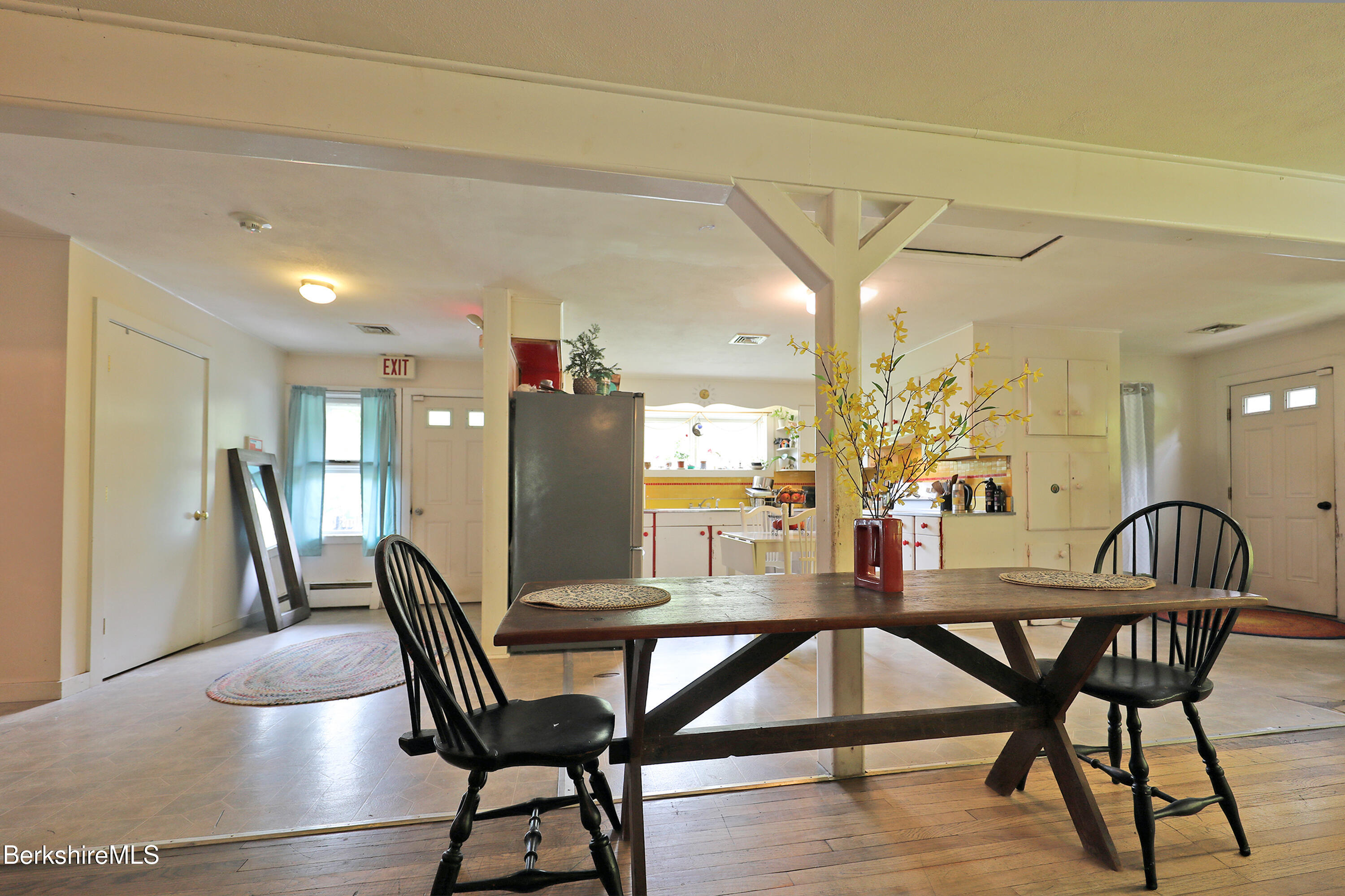 458 Monterey Road Great Barrington, MA 01230 - Photo 18 of 36 a view of a dining room with furniture and wooden floor