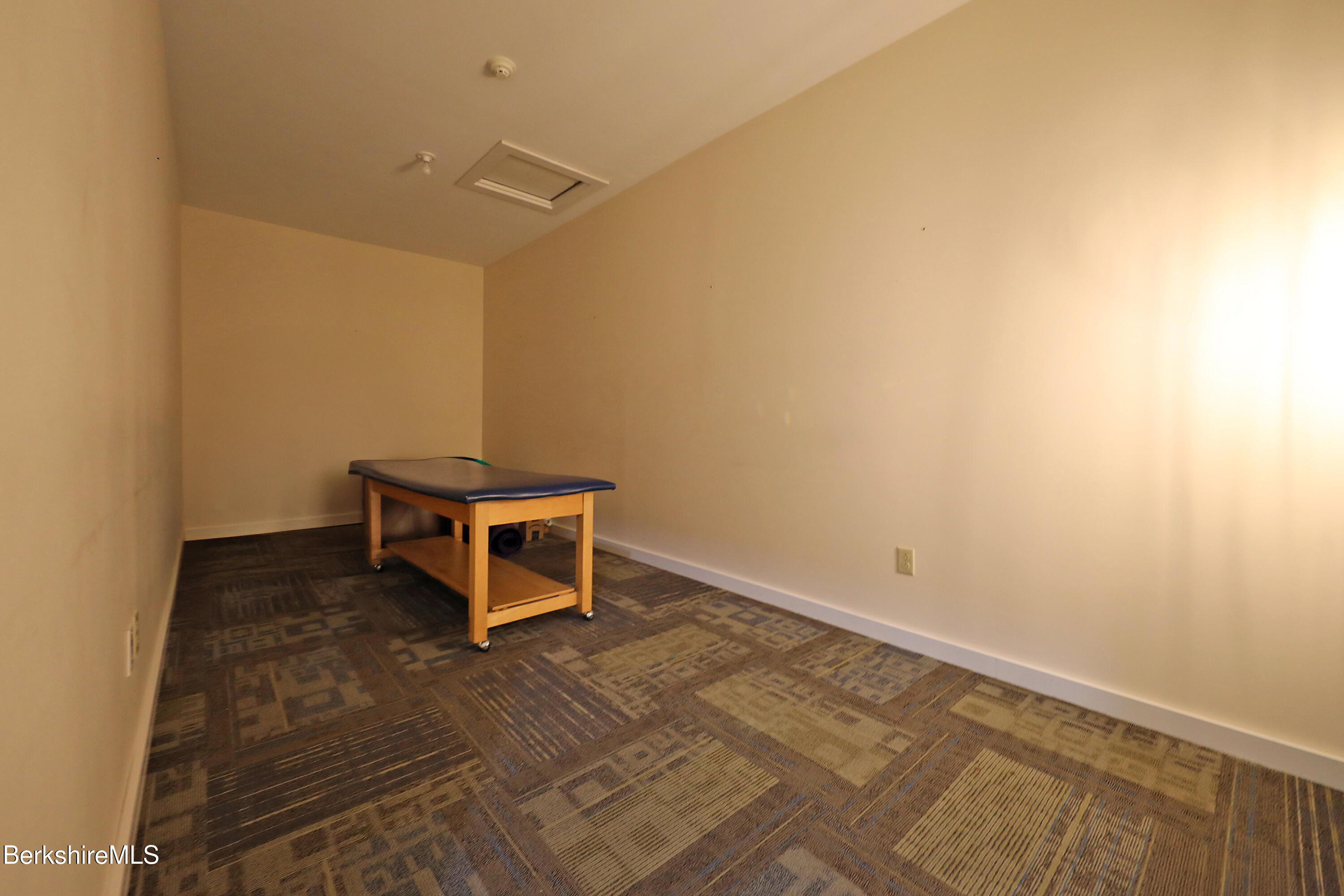 458 Monterey Road Great Barrington, MA 01230 - Photo 27 of 36 a room with a bench