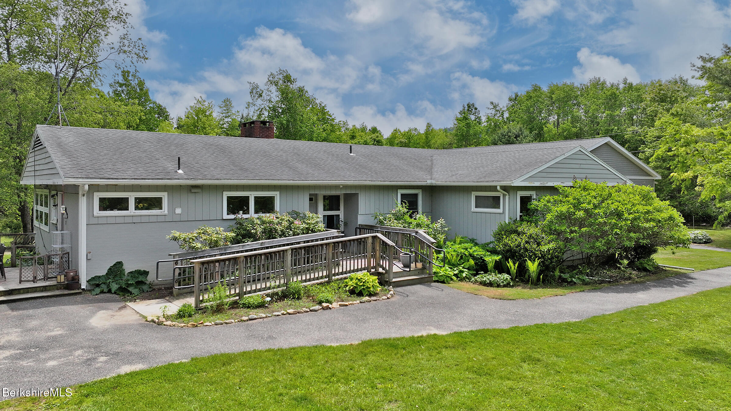 458 Monterey Road Great Barrington, MA 01230 - Photo 36 of 36 a front view of a house with garden