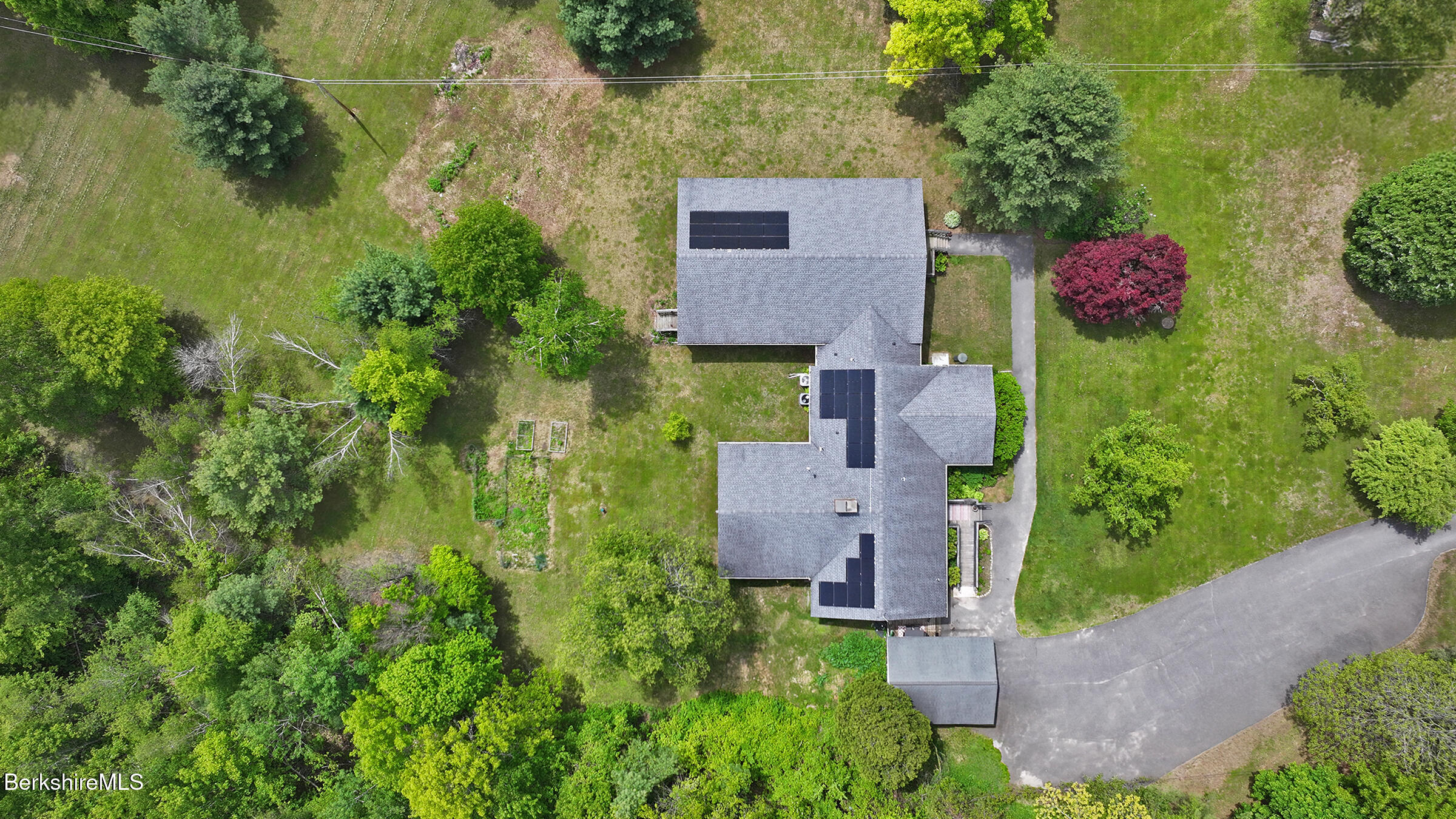 458 Monterey Road Great Barrington, MA 01230 - Photo 6 of 36 an aerial view of a house with a yard
