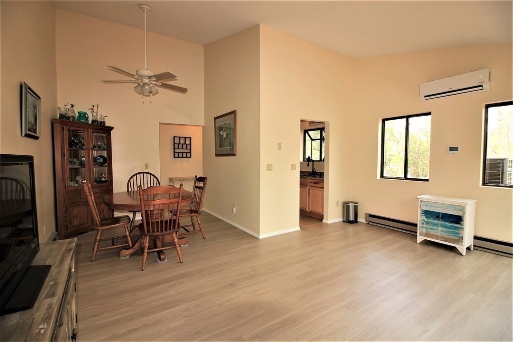30 Round House Road, Unit 30 Bourne, MA 02532 - Photo 11 of 19 a view of a livingroom with furniture and a flat screen tv