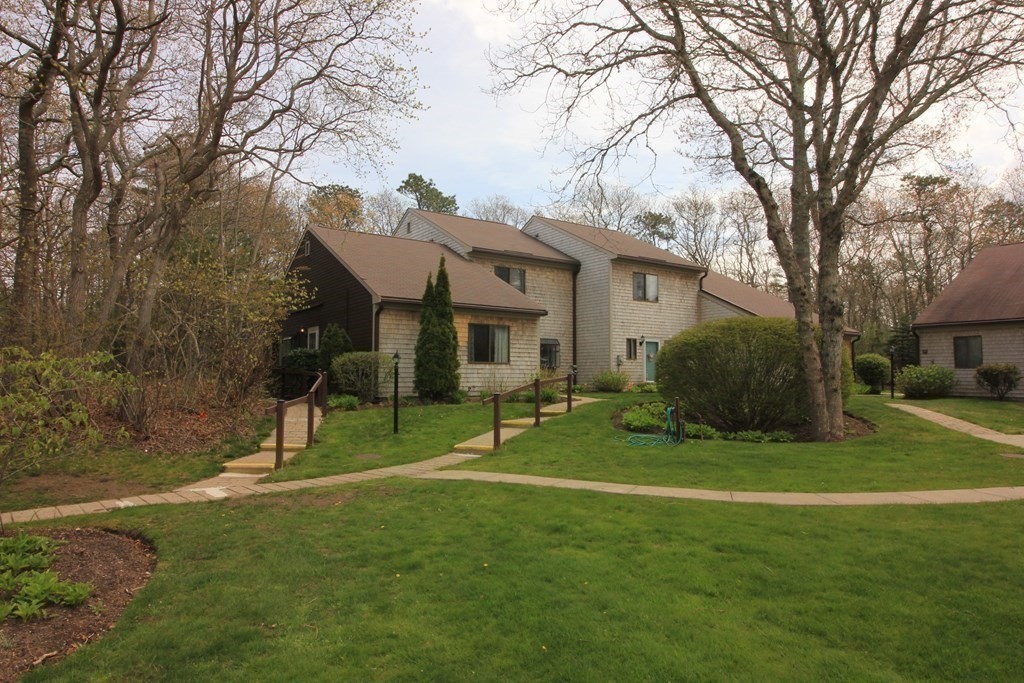 30 Round House Road, Unit 30 Bourne, MA 02532 - Photo 15 of 19 a view of a house with a yard
