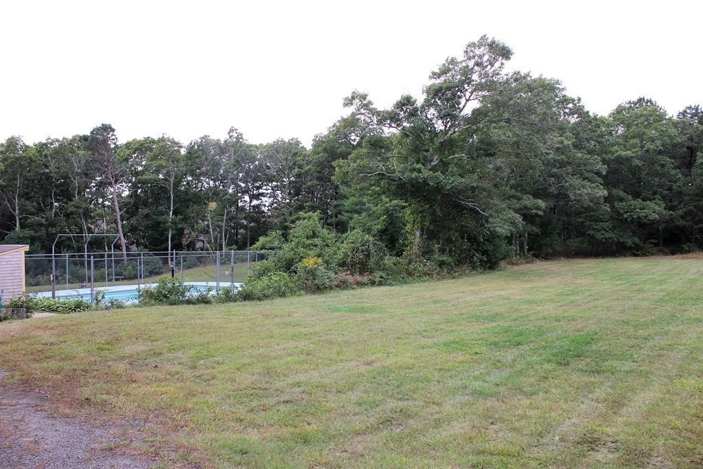 30 Round House Road, Unit 30 Bourne, MA 02532 - Photo 18 of 19 a view of a backyard