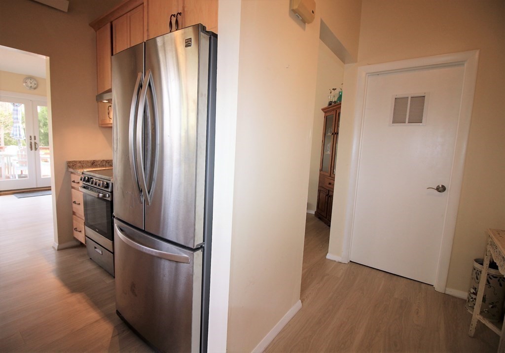 30 Round House Road, Unit 30 Bourne, MA 02532 - Photo 3 of 19 a kitchen with stainless steel appliances a refrigerator and a stove