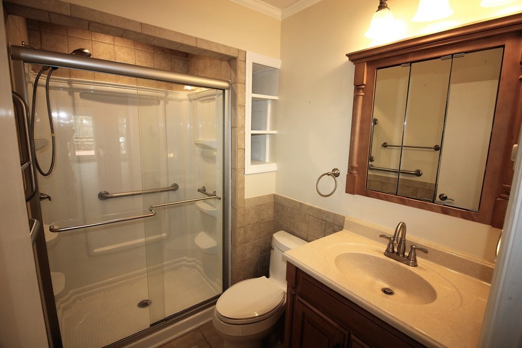 30 Round House Road, Unit 30 Bourne, MA 02532 - Photo 5 of 19 a bathroom with a sink a toilet and shower