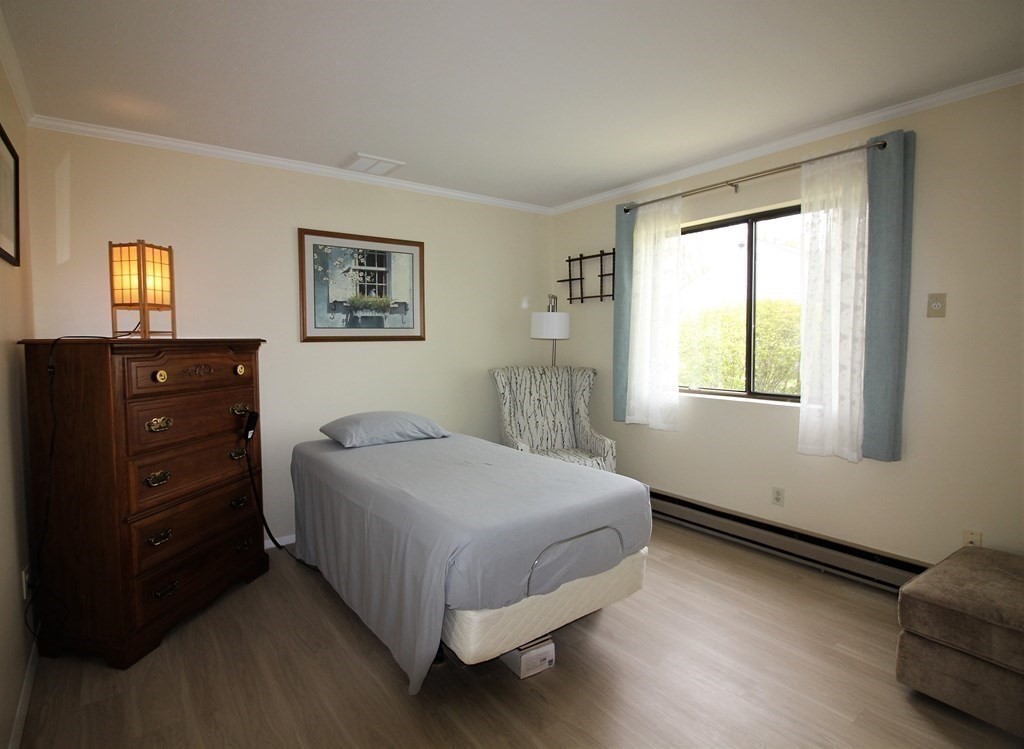 30 Round House Road, Unit 30 Bourne, MA 02532 - Photo 6 of 19 a bedroom with a bed and window