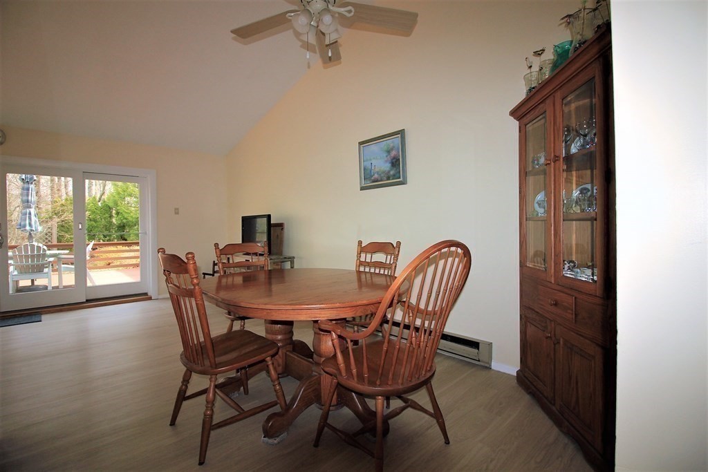 30 Round House Road, Unit 30 Bourne, MA 02532 - Photo 9 of 19 a view of a dining room with furniture window and outside view