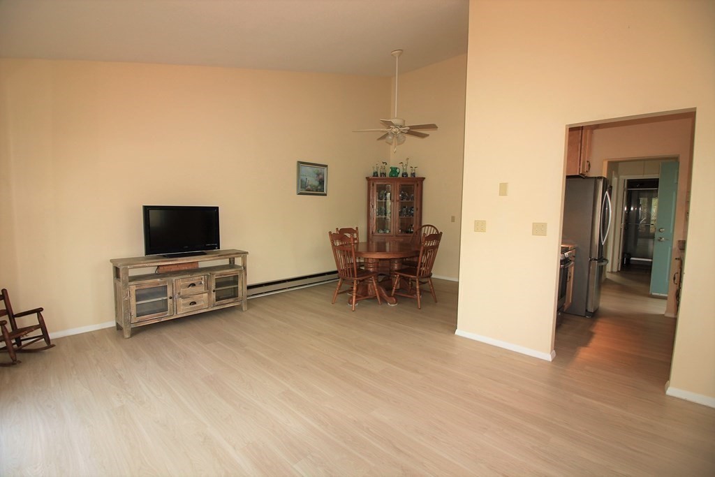 30 Round House Road, Unit 30 Bourne, MA 02532 - Photo 10 of 19 a living room with furniture and a flat screen tv