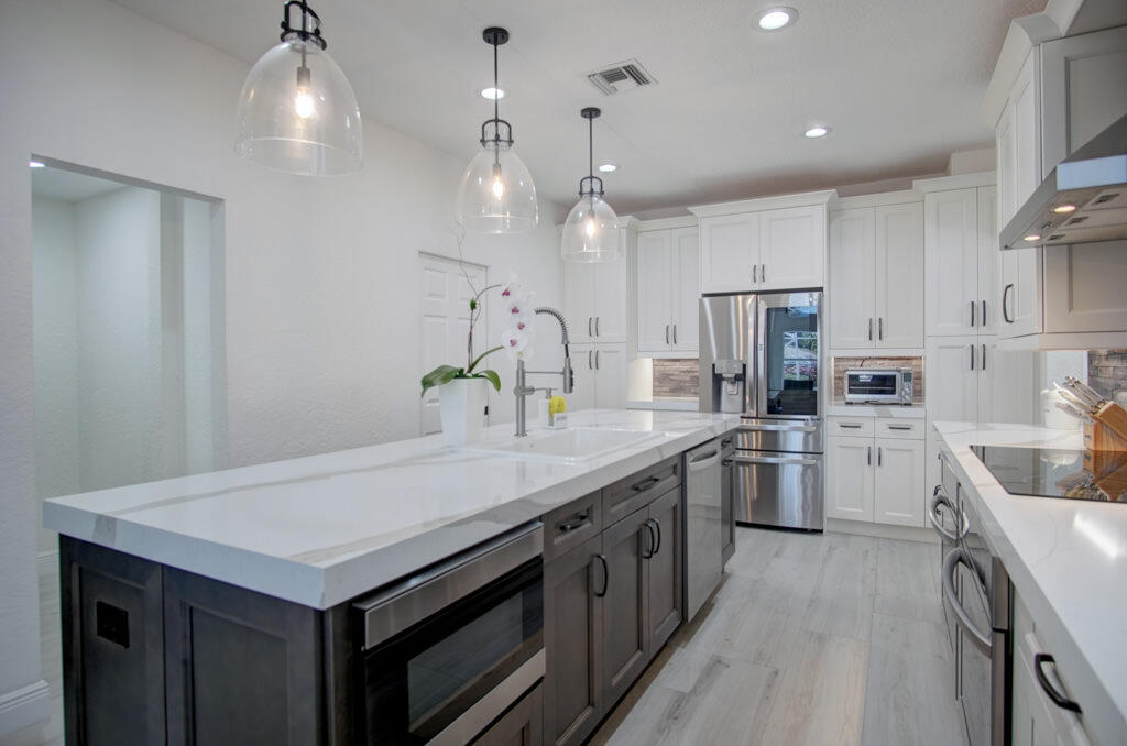 12354 Cascades Pointe Drive Boca Raton, FL 33428 - Photo 16 of 53 Kitchen Island
