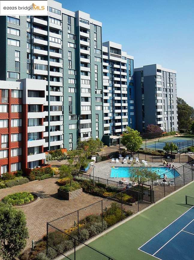 a view of a city with tall buildings