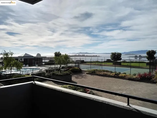 a view of residential houses with outdoor space