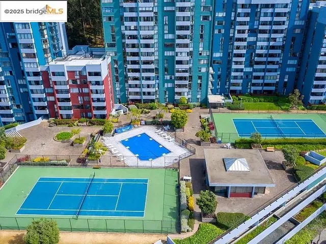 a view of a city with tall buildings