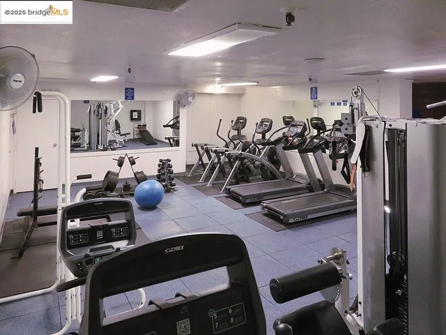 a view of a room with gym equipment