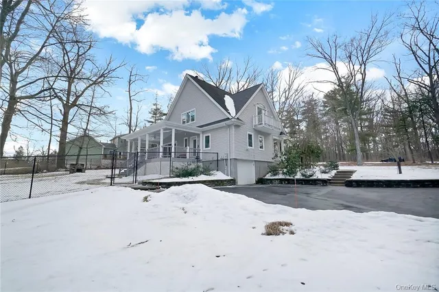 a view of multiple house with a street