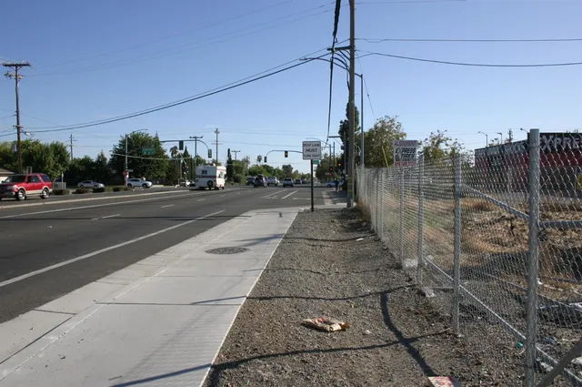 a view of a pathway both side of building