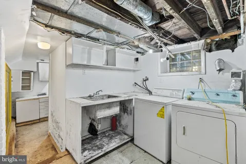 a view of a room with wooden walls