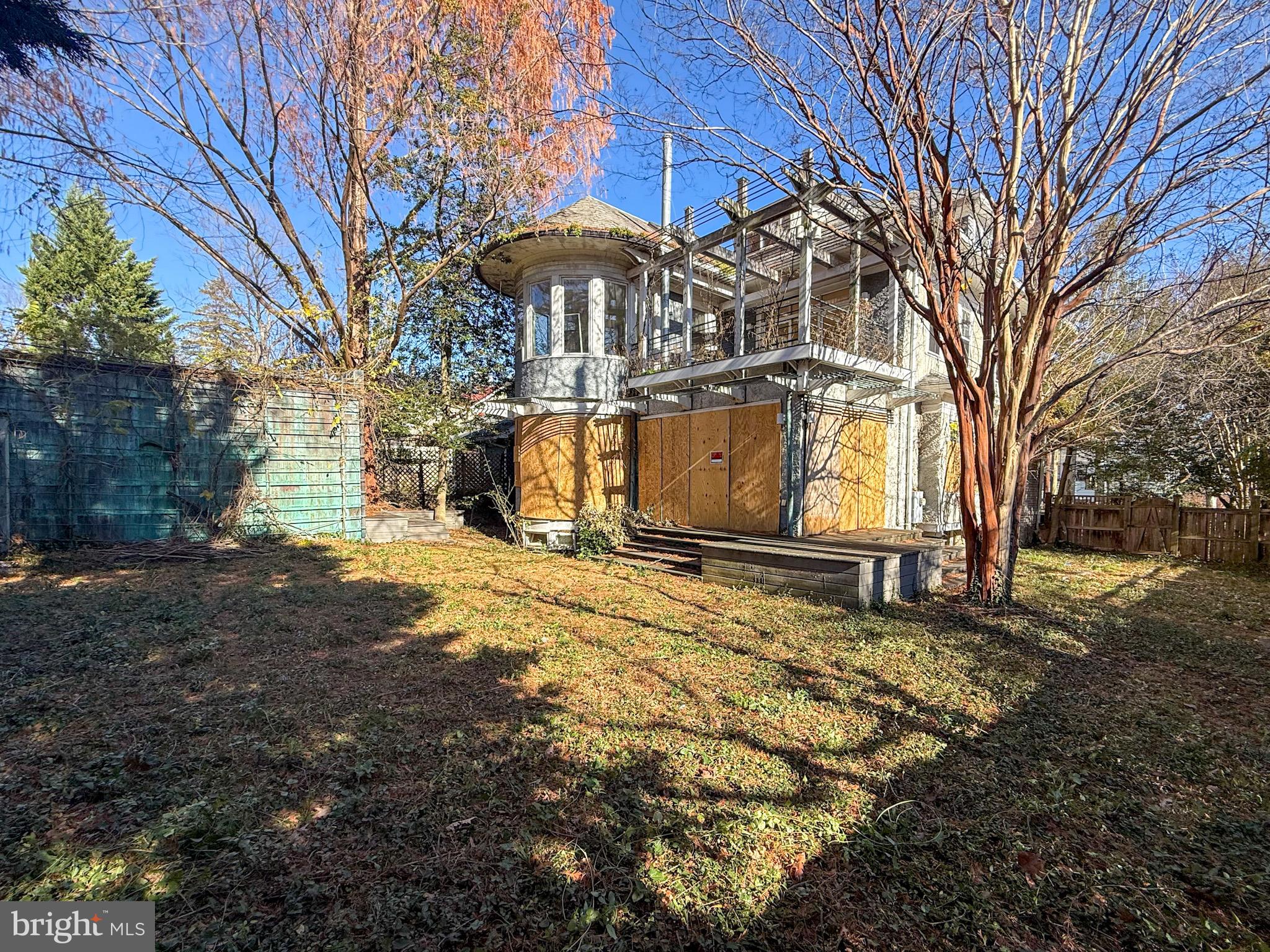 2700 36th Street Northwest Washington, DC 20007 - Photo 5 of 15 a view of a house with a yard