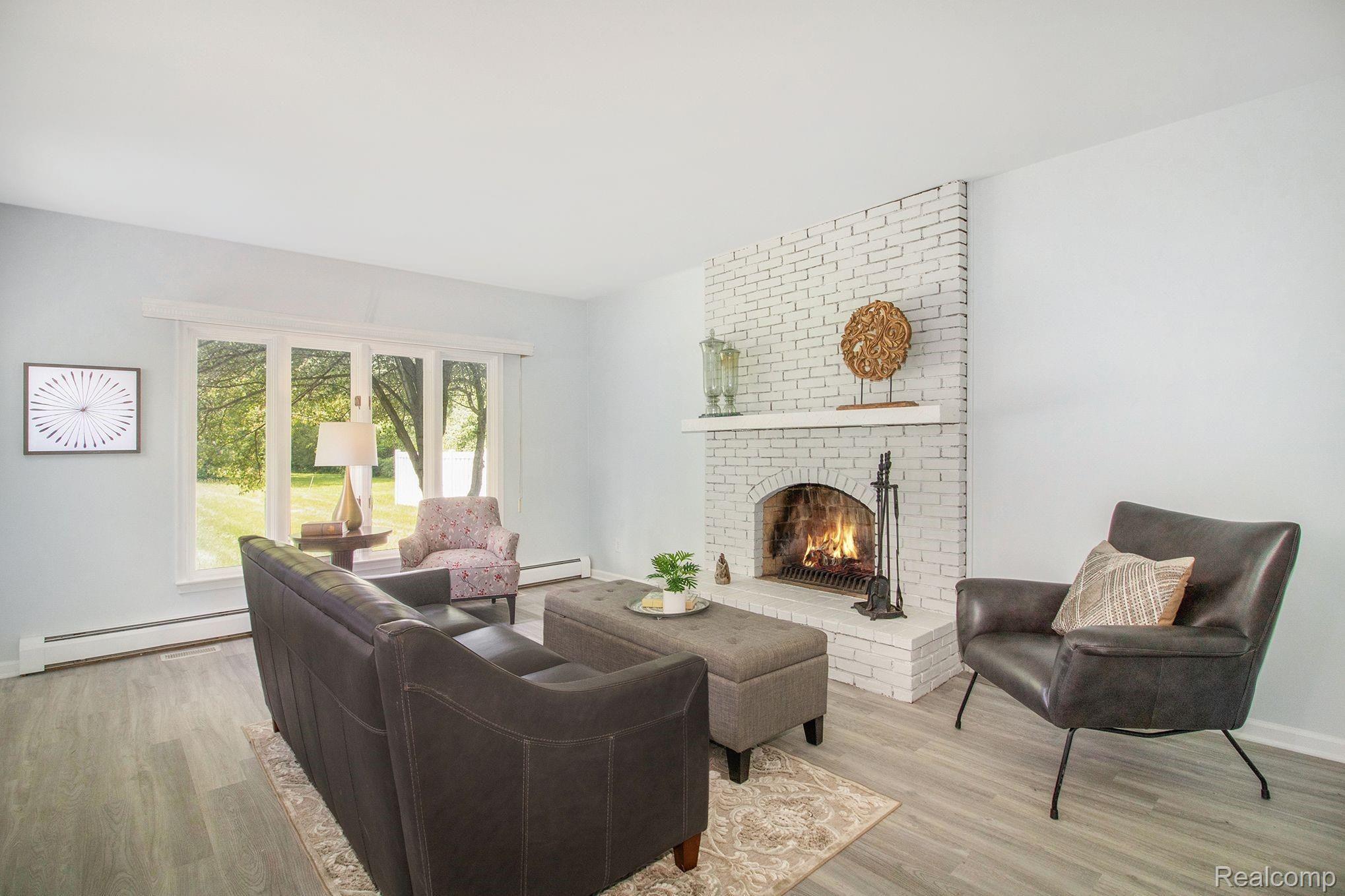 30507 West Road New Boston, MI 48164 - Photo 11 of 28 BEAUTIFUL FAMILY ROOM WITH NATURAL FIREPLACE